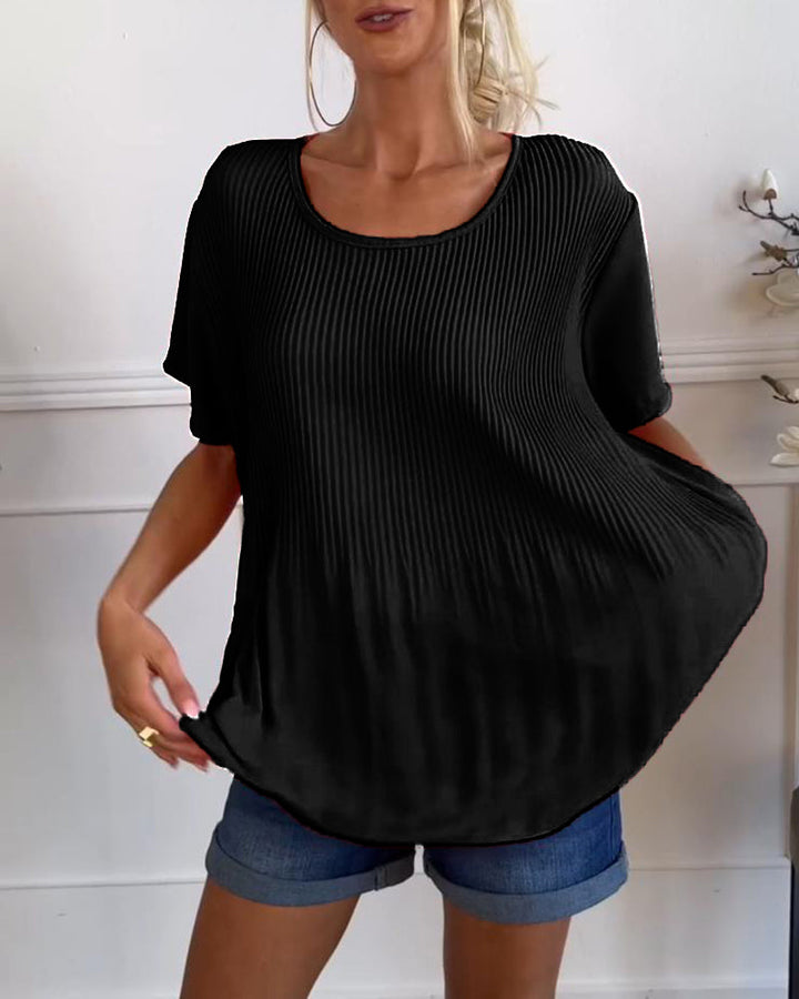 Blouse plissée unie avec col rond