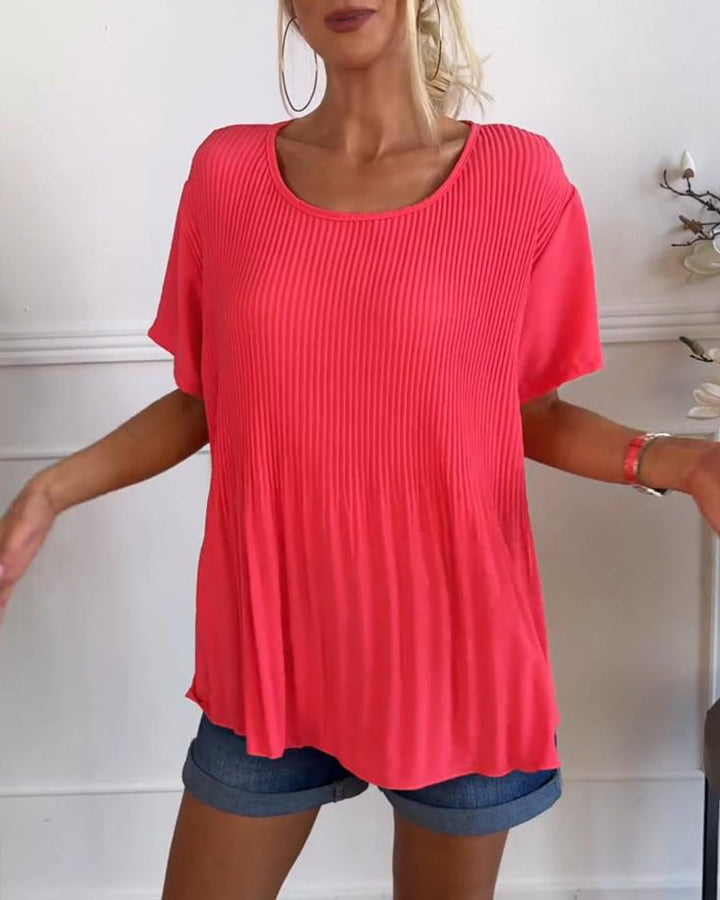 Blouse plissée unie avec col rond