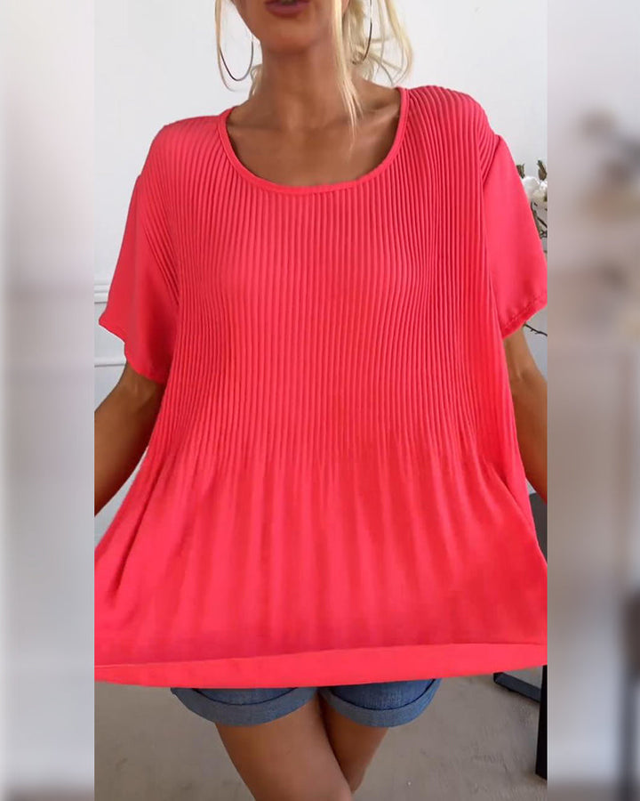 Blouse plissée unie avec col rond