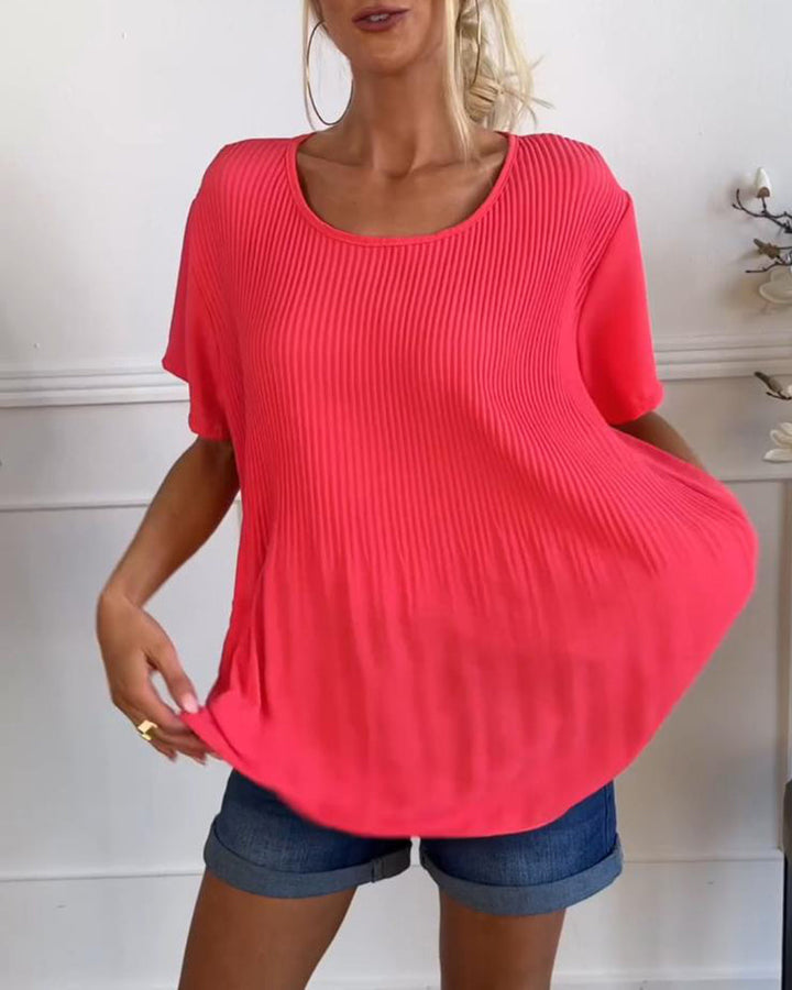 Blouse plissée unie avec col rond